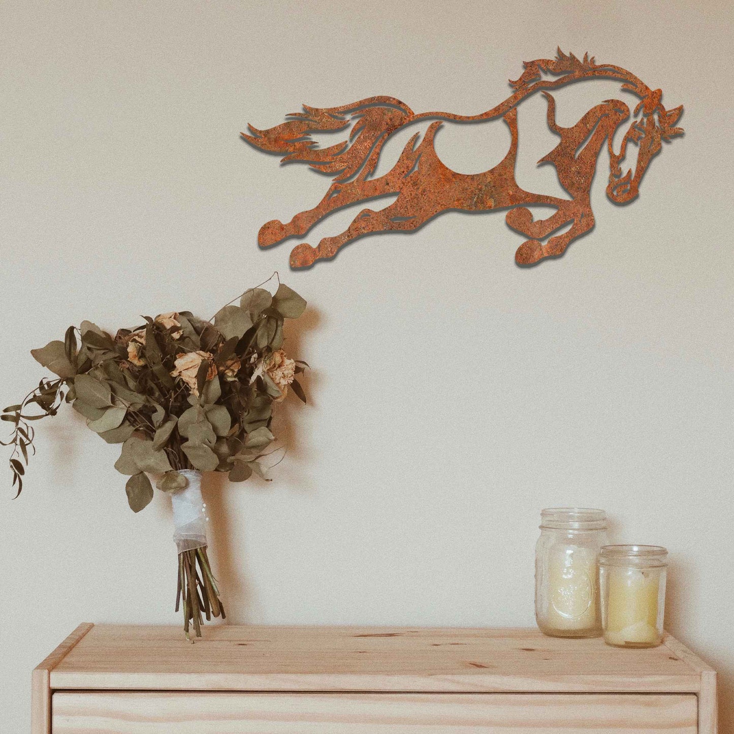 A dynamic design of a galloping horse, featuring flowing mane and tail, capturing a sense of motion and energy.