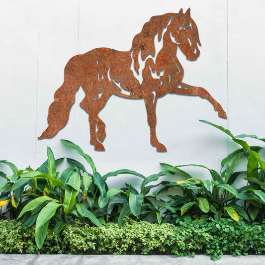Metal wall art of a horse with a proud stance, featuring flowing mane and tail, captured in a dynamic pose. The design emphasizes strength and elegance, showcasing the horse's muscular form.