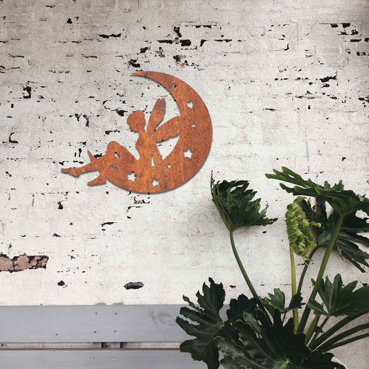 This design features a fairy sitting on a crescent moon, surrounded by stars. The delicate form of the fairy and the celestial details of the moon and stars convey a sense of magic and tranquility, making it a whimsical addition to any space.