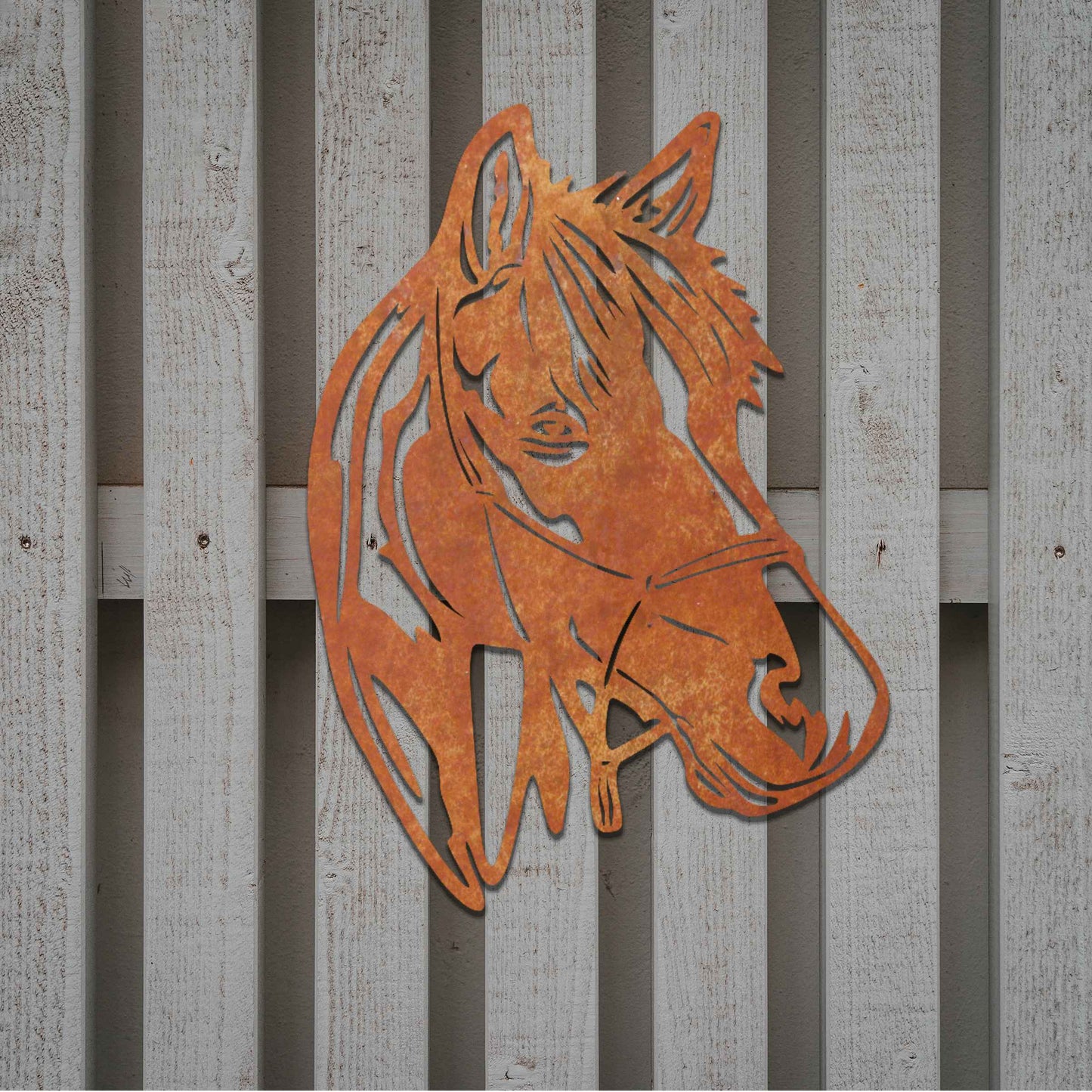 The design showcases the head of a horse in a minimalist style, highlighting its gentle expression and flowing mane. The silhouette captures the elegance and strength of the animal.