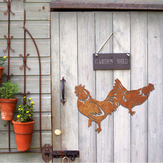 A beautifully crafted design of two roosters in motion, showcasing intricate details and bold lines. This unique piece adds a lively, rustic touch to any decor, highlighting the dynamic nature of the birds.