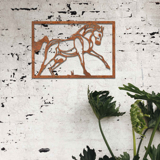 Metal wall art featuring an elegant horse in motion, outlined with bold lines and set within a rectangular frame. The artwork captures the graceful movement of the horse in a minimalistic style.