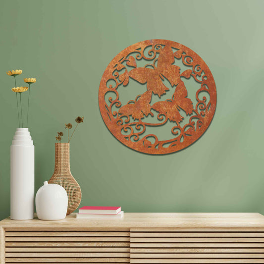 Metal garden decoration featuring a circular design with intricate butterflies and swirling vine patterns, adding a touch of elegance and nature-inspired artistry to outdoor or indoor spaces.