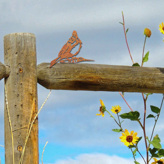 Metal garden decoration featuring a hoopoe bird silhouette with intricate cutout details and a rustic finish, designed to sit atop fences or posts, adding a distinctive and elegant touch to outdoor spaces.
