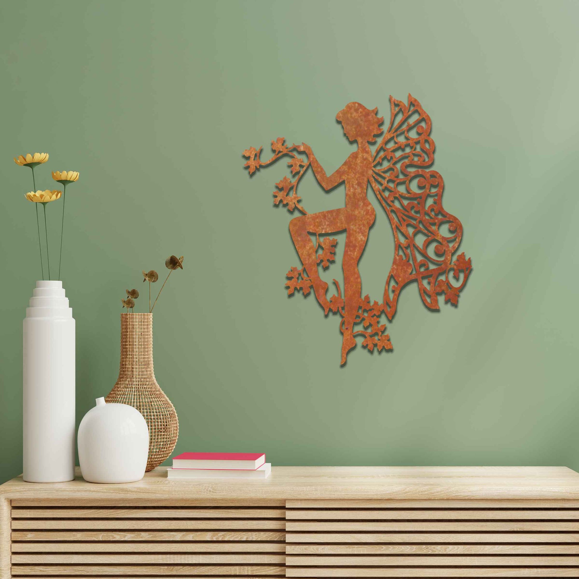 This design features a graceful fairy holding a delicate flower vine, with her wings artfully adorned in intricate patterns. The elegant pose and detailed flow of flowers evoke a sense of lightness and enchantment.