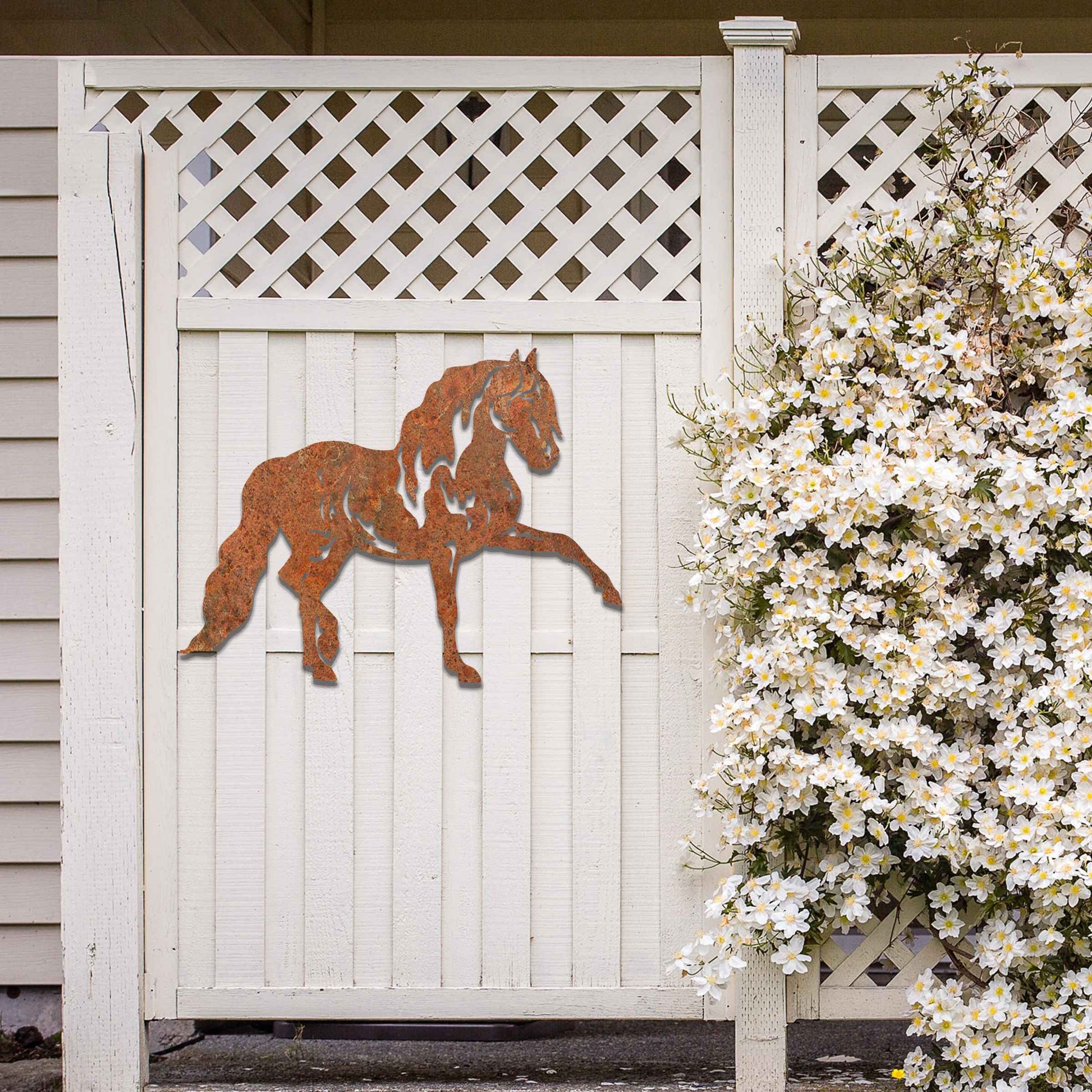 Metal wall art of a horse with a proud stance, featuring flowing mane and tail, captured in a dynamic pose. The design emphasizes strength and elegance, showcasing the horse's muscular form.