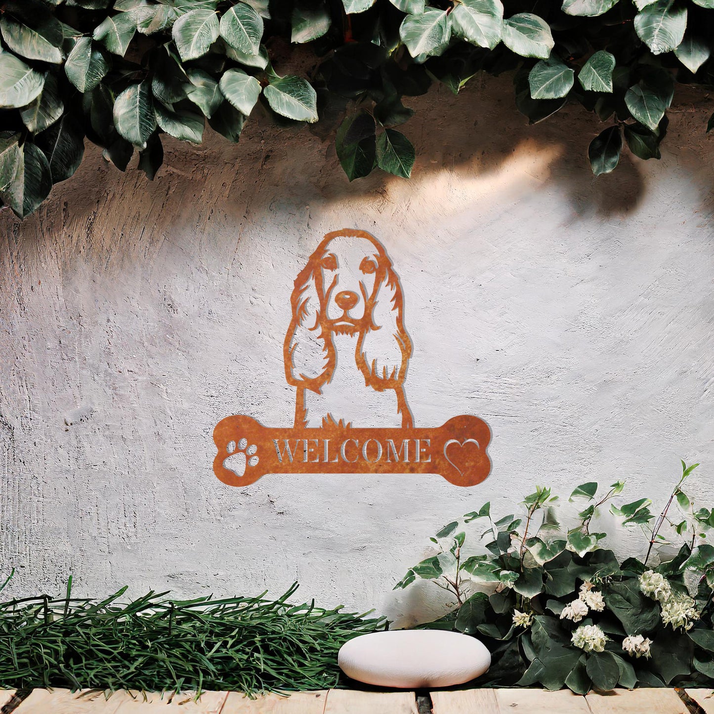 Metal Cocker Spaniel dog design with a bone-shaped 'WELCOME' text and paw prints, perfect for adding a friendly and welcoming touch to entryways or outdoor spaces.