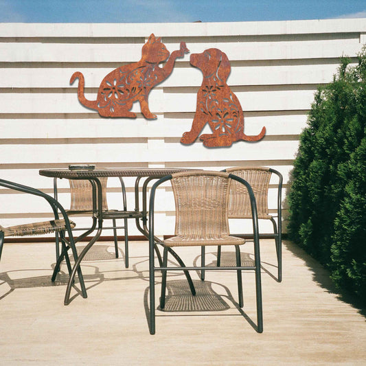 Metal garden decoration set featuring a playful cat reaching for a butterfly and a sitting dog, both adorned with intricate floral patterns, adding a whimsical and charming touch to outdoor walls or fences.
