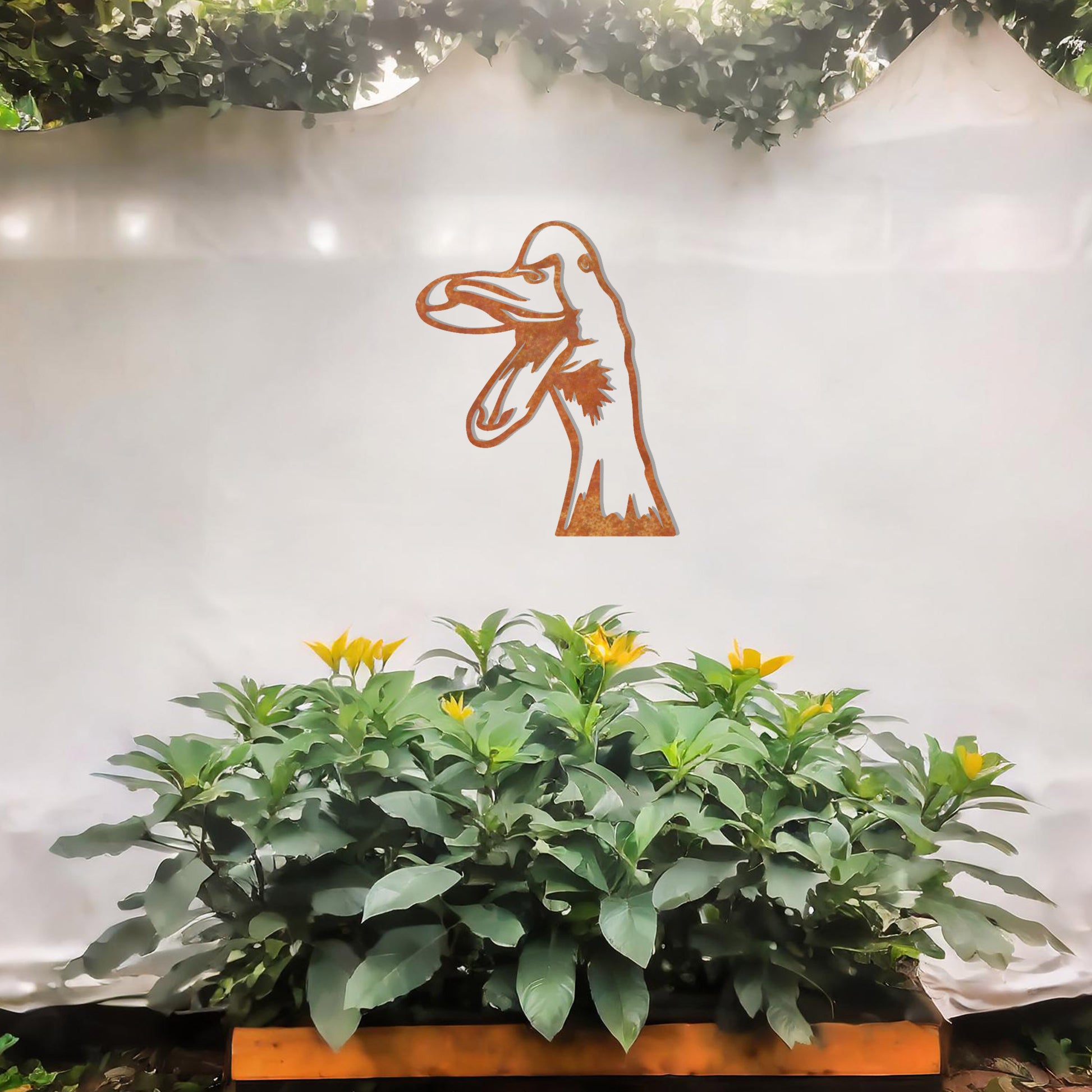 A quirky metal wall art of a duck with an open beak, showcasing playful and artistic detail. This unique design adds a touch of humor and charm to any modern setting, surrounded by greenery and soft floral accents.