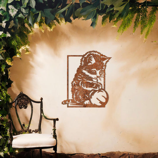 This is a cute metal wall art design featuring a playful kitten sitting and playing with a ball. The design captures the cat's natural curiosity and playful spirit, making it a perfect addition for cat lovers or for adding a touch of whimsy to a space