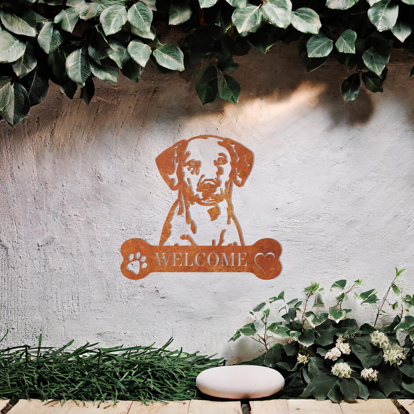 Metal Dalmatian dog design with a bone-shaped 'WELCOME' text and paw prints, perfect for adding a friendly and welcoming touch to entryways or outdoor spaces.