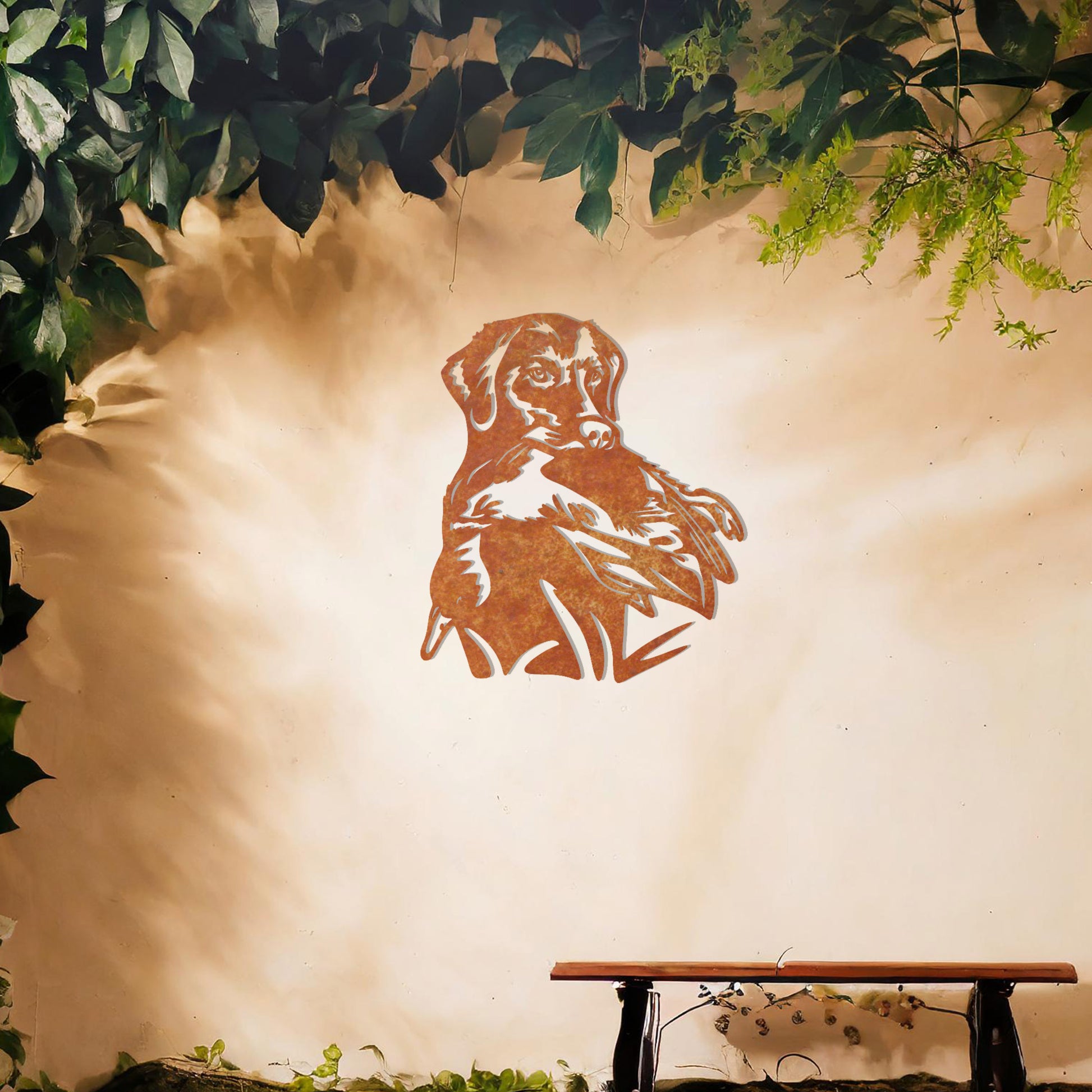 This image features a beautifully detailed metal wall art design of a dog holding a bird in its mouth. The elegant lines capture the dog’s focused expression and the movement of the bird, ideal for pet lovers or those who appreciate wildlife and animals in art.