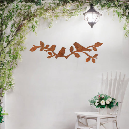 This design features a group of birds perched gracefully on a leafy branch, creating a serene and natural aesthetic. The intricate silhouettes of the birds and leaves make this artwork ideal for adding a touch of nature-inspired elegance to any wall.