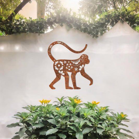 This design showcases a playful monkey adorned with floral patterns and intricate details. The artistic use of flowers and decorative elements within the silhouette gives the piece a whimsical and elegant charm, perfect for enhancing indoor or outdoor settings with a tropical or exotic theme.