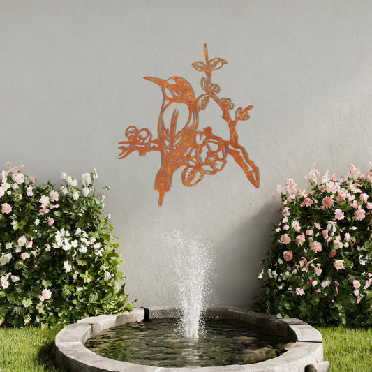 This design showcases a perched bird surrounded by detailed blossoms and branches. The intricate artistry highlights the bird's delicate features and the natural elegance of the flowers, making it a beautiful addition to any nature-inspired space.