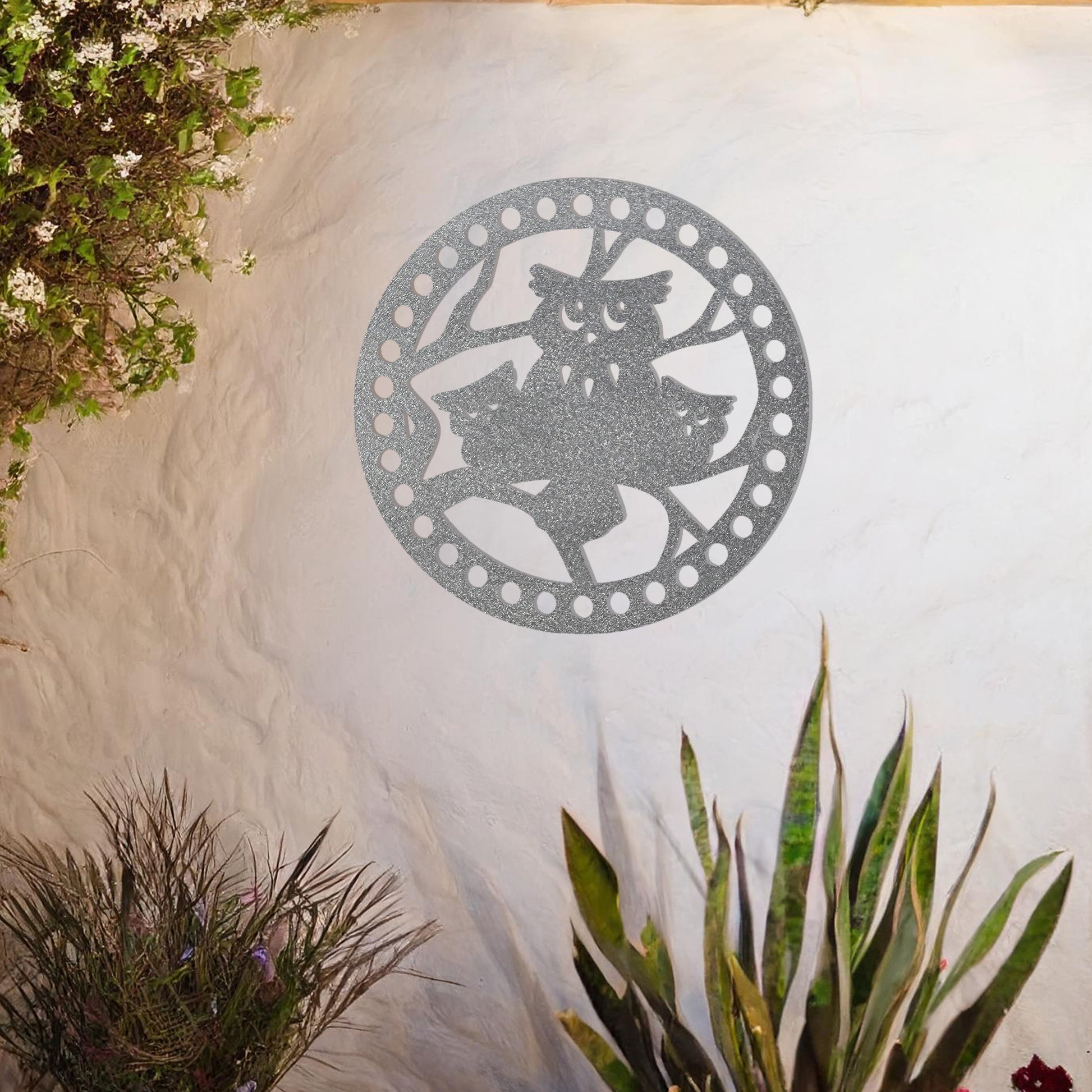 This design portrays a charming family of owls perched within a circular frame. The intricate details and playful expressions add a whimsical touch, making it an ideal piece for nature lovers or those seeking a quirky and unique wall decoration.
