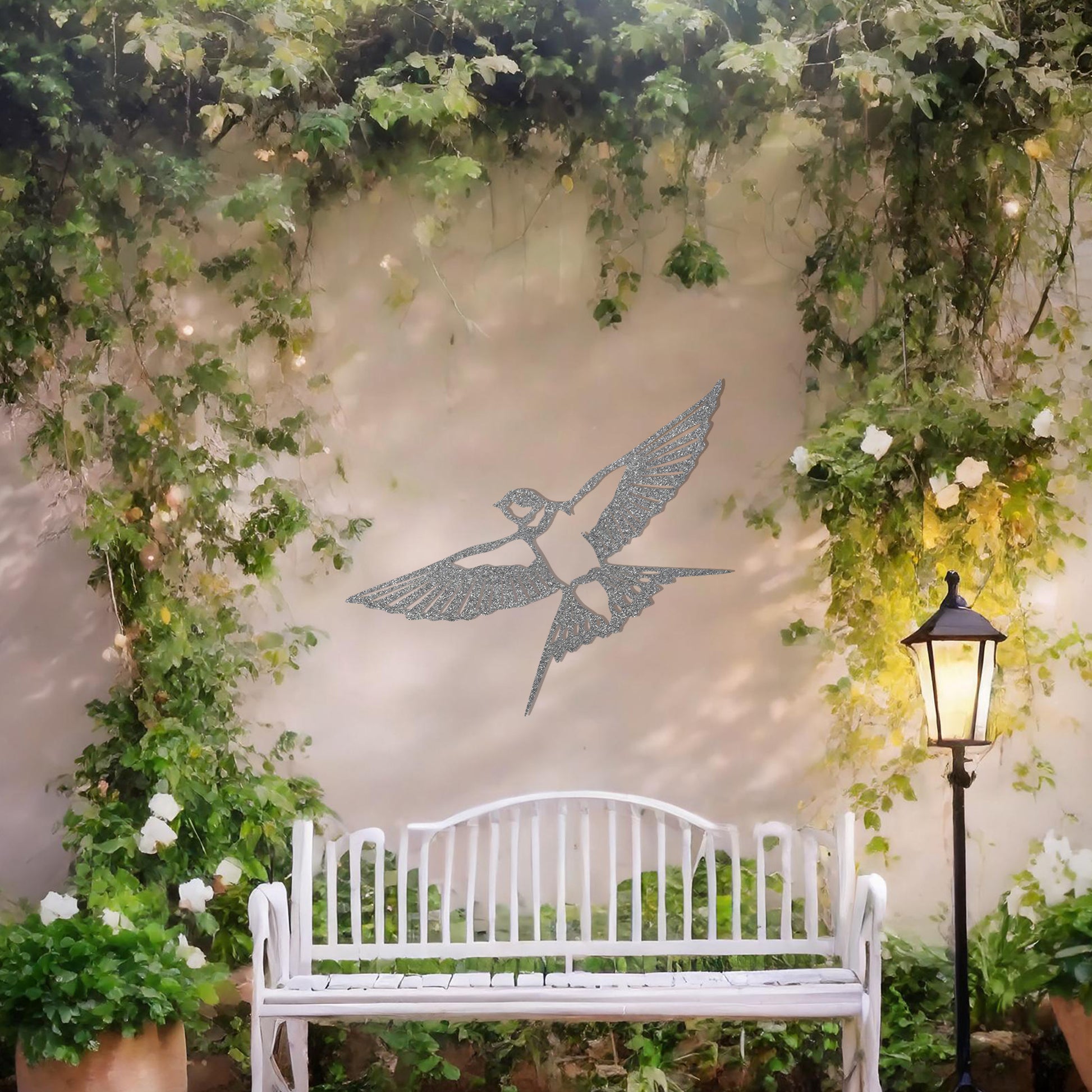 Metal garden decoration featuring a bird in mid-flight with detailed wings and tail, elegantly designed to bring a touch of nature-inspired charm and artistry to outdoor walls or garden settings.