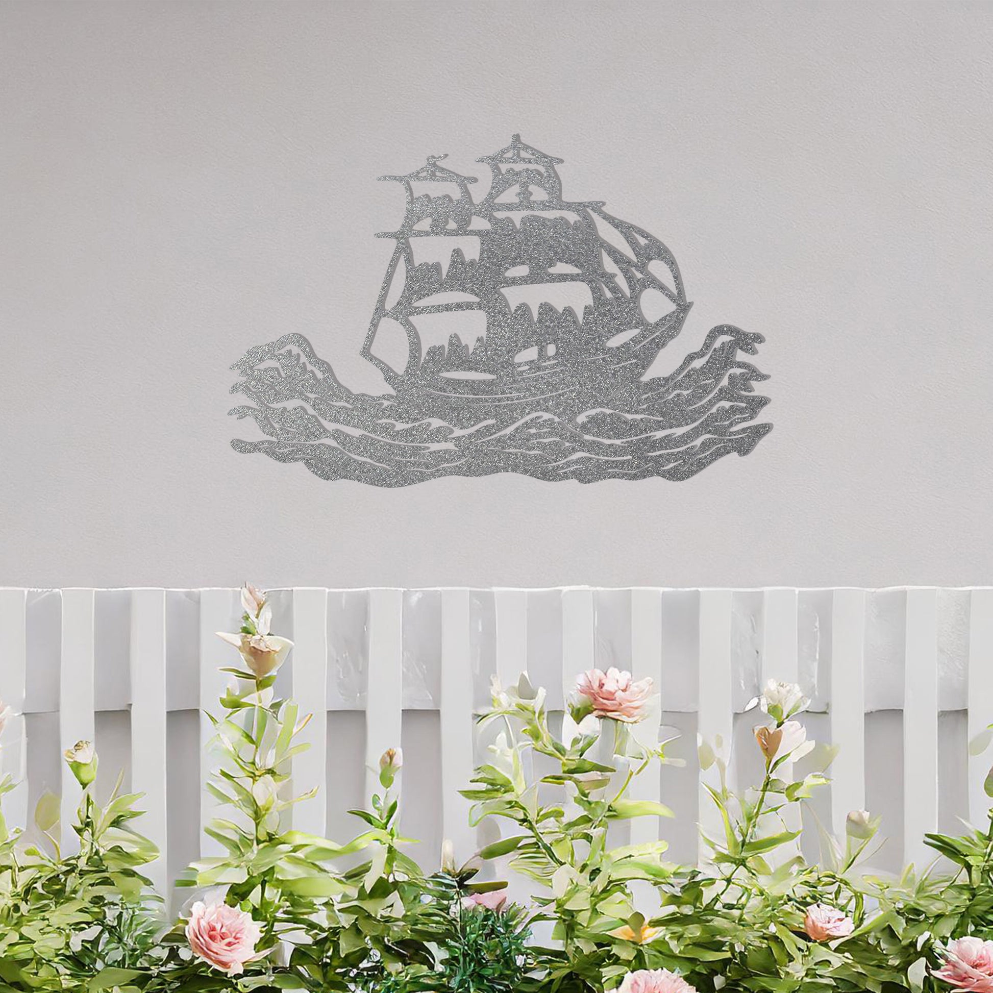 This design features an elegant silhouette of a sailing ship braving dynamic ocean waves, capturing a sense of adventure and exploration. The intricate details of the ship's sails and rigging make it a striking and timeless piece of decor.
