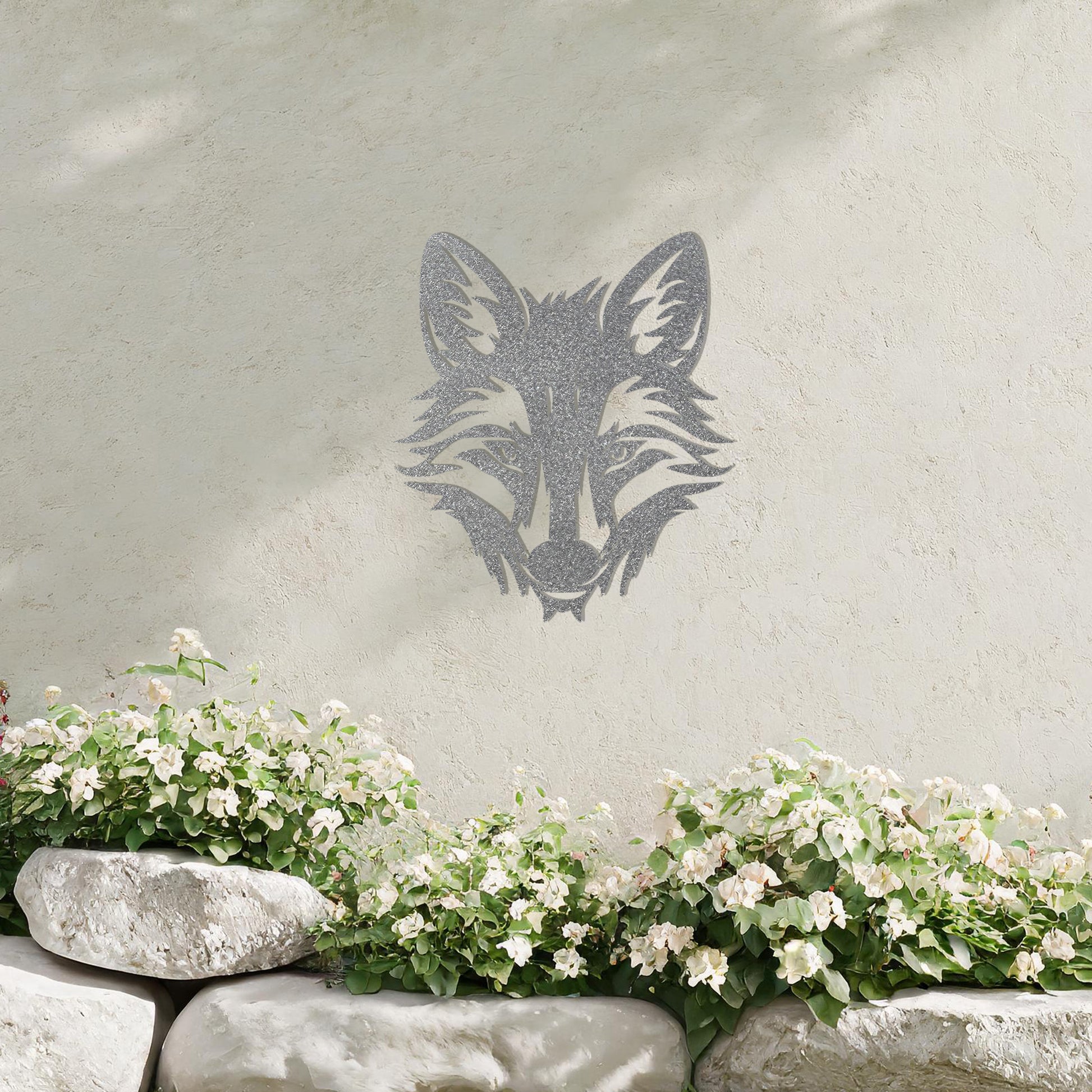 A captivating metal wall art design of a fox's face, intricately crafted with sharp lines and elegant details, representing grace and cunning. Ideal for enhancing interiors with a touch of the wild.