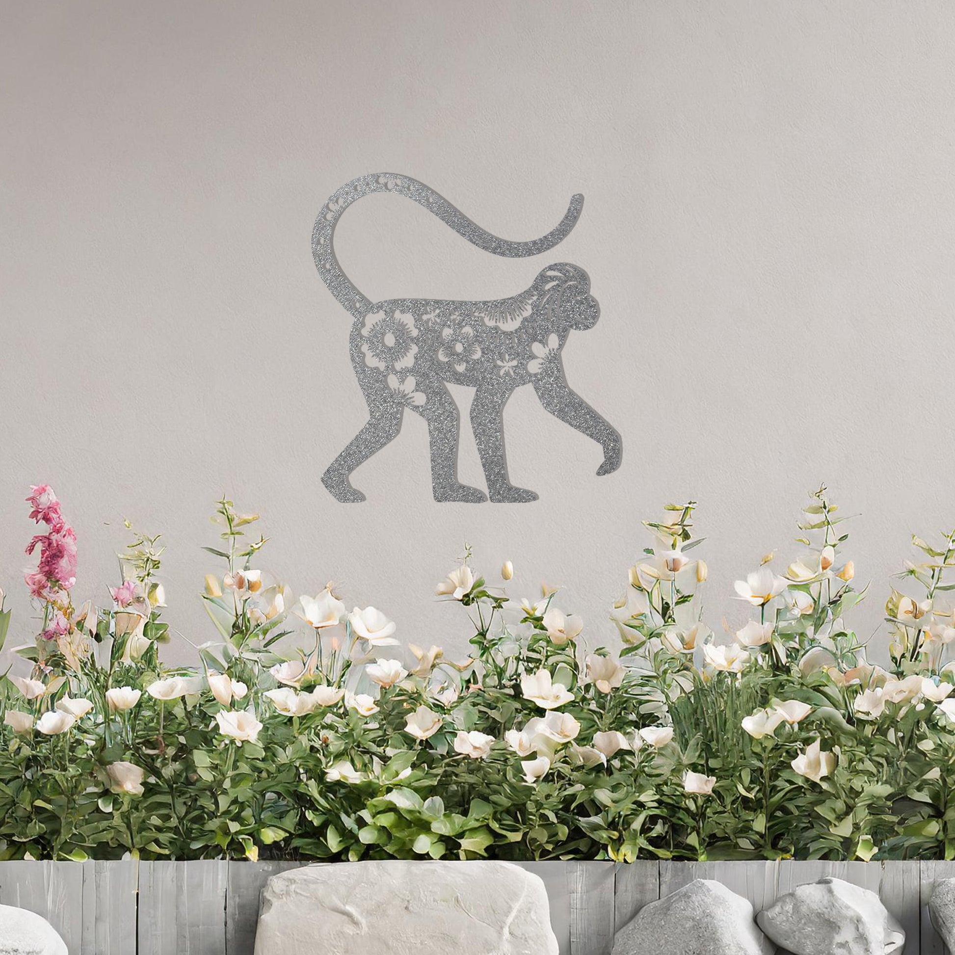 This design showcases a playful monkey adorned with floral patterns and intricate details. The artistic use of flowers and decorative elements within the silhouette gives the piece a whimsical and elegant charm, perfect for enhancing indoor or outdoor settings with a tropical or exotic theme.