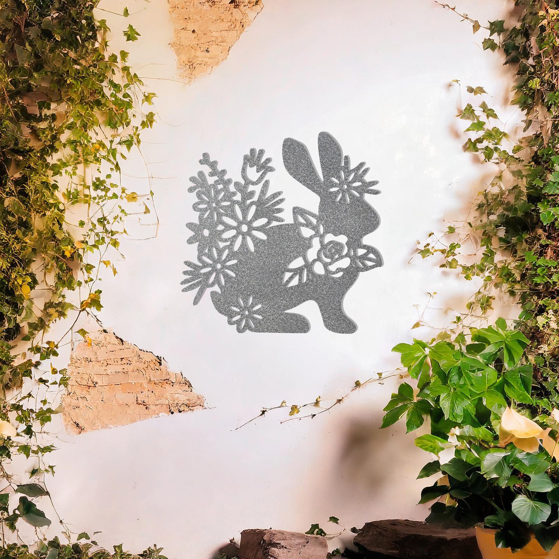 This design showcases a rabbit surrounded by an intricate arrangement of flowers, blending nature's elegance with the charm of wildlife. The delicate floral details enhance the overall beauty of the piece.