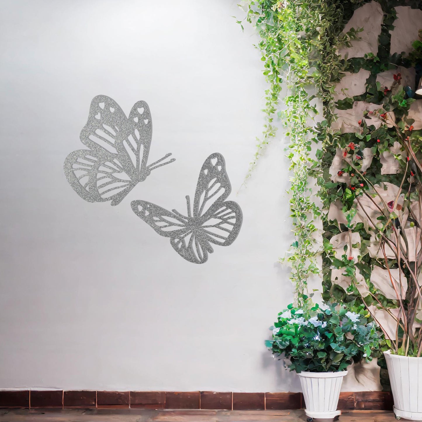This design showcases a pair of intricately detailed butterflies in flight, their delicate wings adorned with heart-shaped accents. A charming addition to any space, celebrating the beauty of nature and the grace of butterflies.