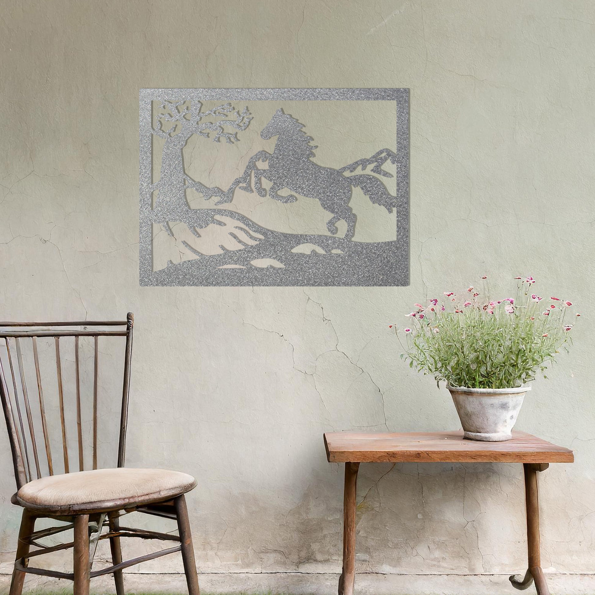 This wall art design depicts a majestic horse rearing up on a hillside, surrounded by a tree and mountain scenery, all encapsulated within a rectangular frame. A perfect addition for nature lovers and equestrian enthusiasts.