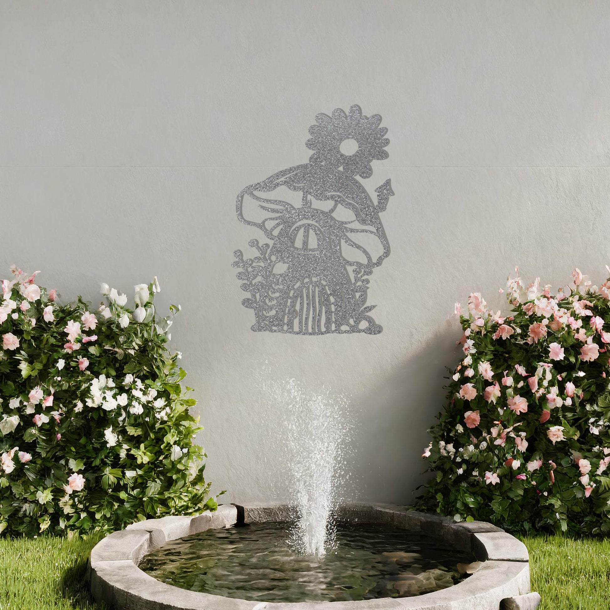 This piece depicts a whimsical mushroom house with a flower on top, surrounded by plants. Its enchanting design, perfect for garden or indoor decor, adds charm to any space with its delightful details.