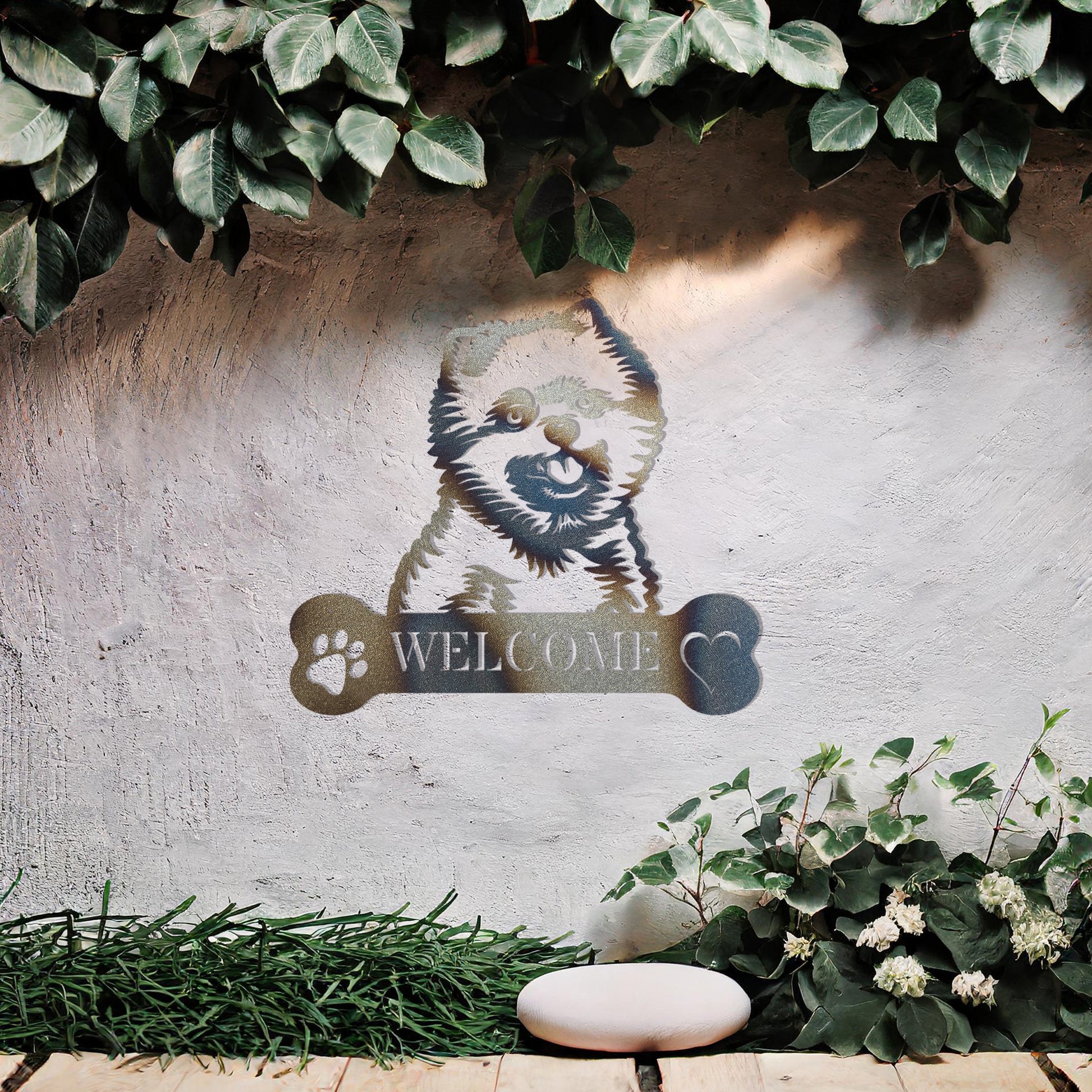 Metal Pomeranian dog design with a bone-shaped 'WELCOME' text and paw prints, perfect for adding a friendly and welcoming touch to entryways or outdoor spaces.