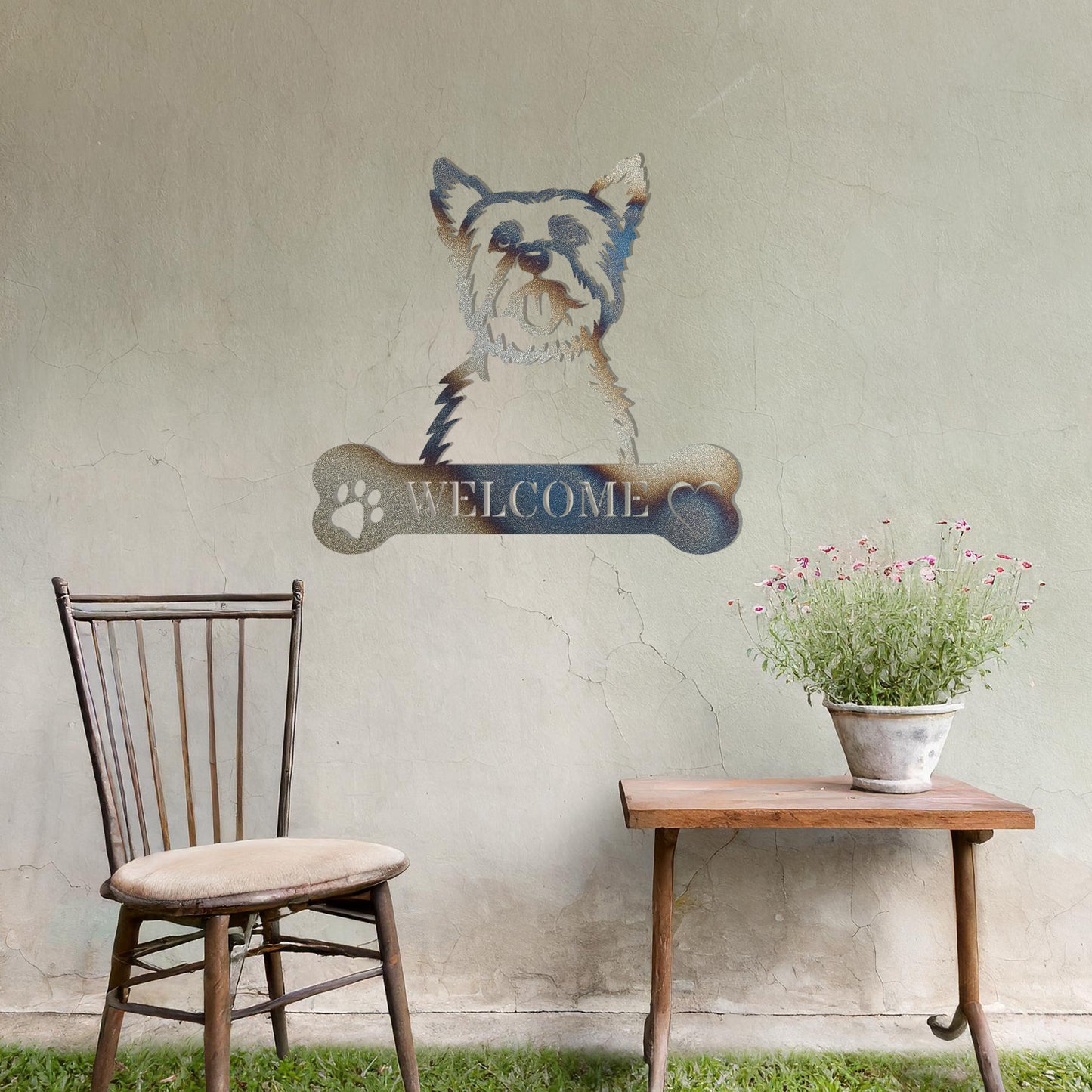 Metal Yorkshire Terrier dog design with a bone-shaped 'WELCOME' text and paw prints, perfect for adding a cheerful and welcoming touch to entryways or outdoor spaces.