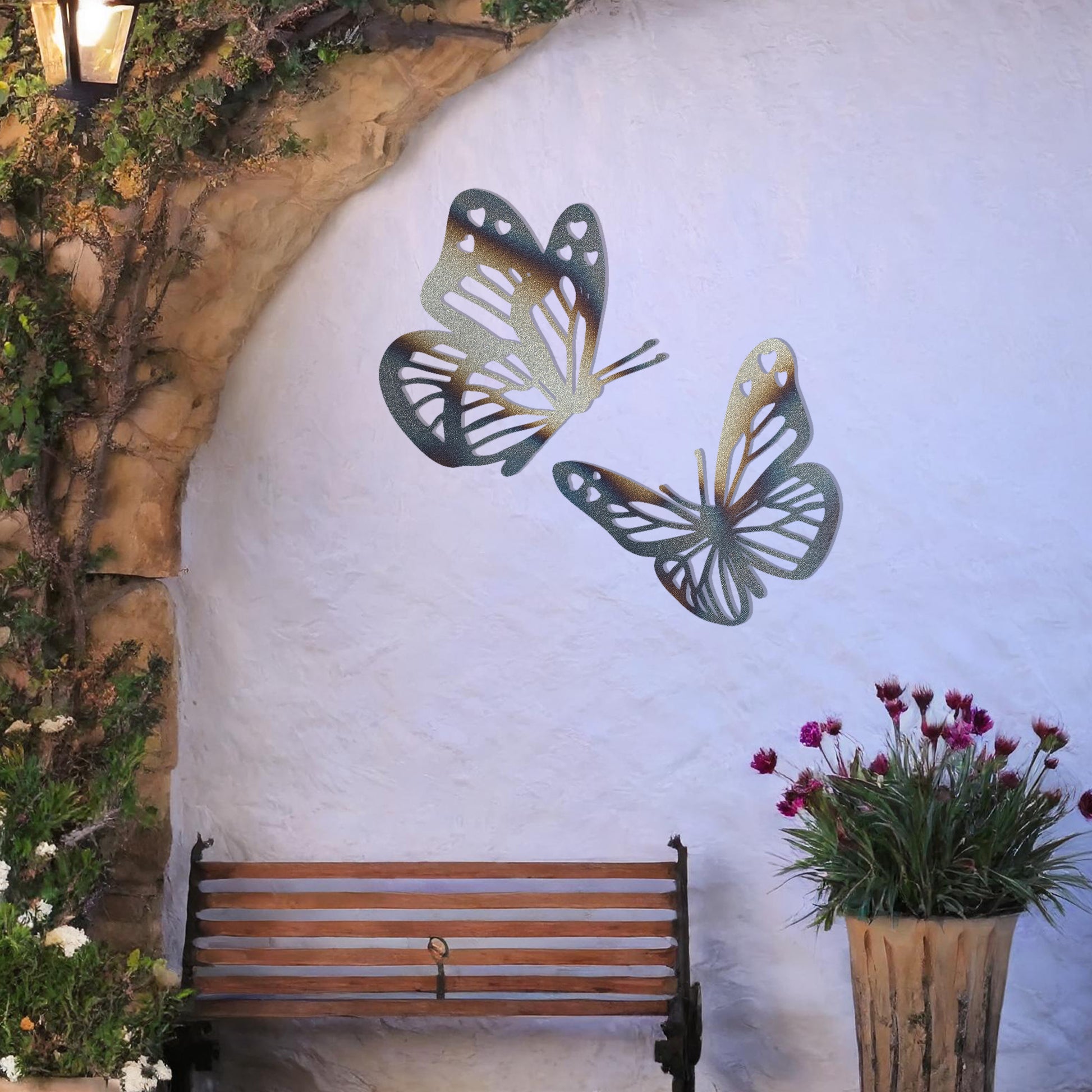 This design showcases a pair of intricately detailed butterflies in flight, their delicate wings adorned with heart-shaped accents. A charming addition to any space, celebrating the beauty of nature and the grace of butterflies.