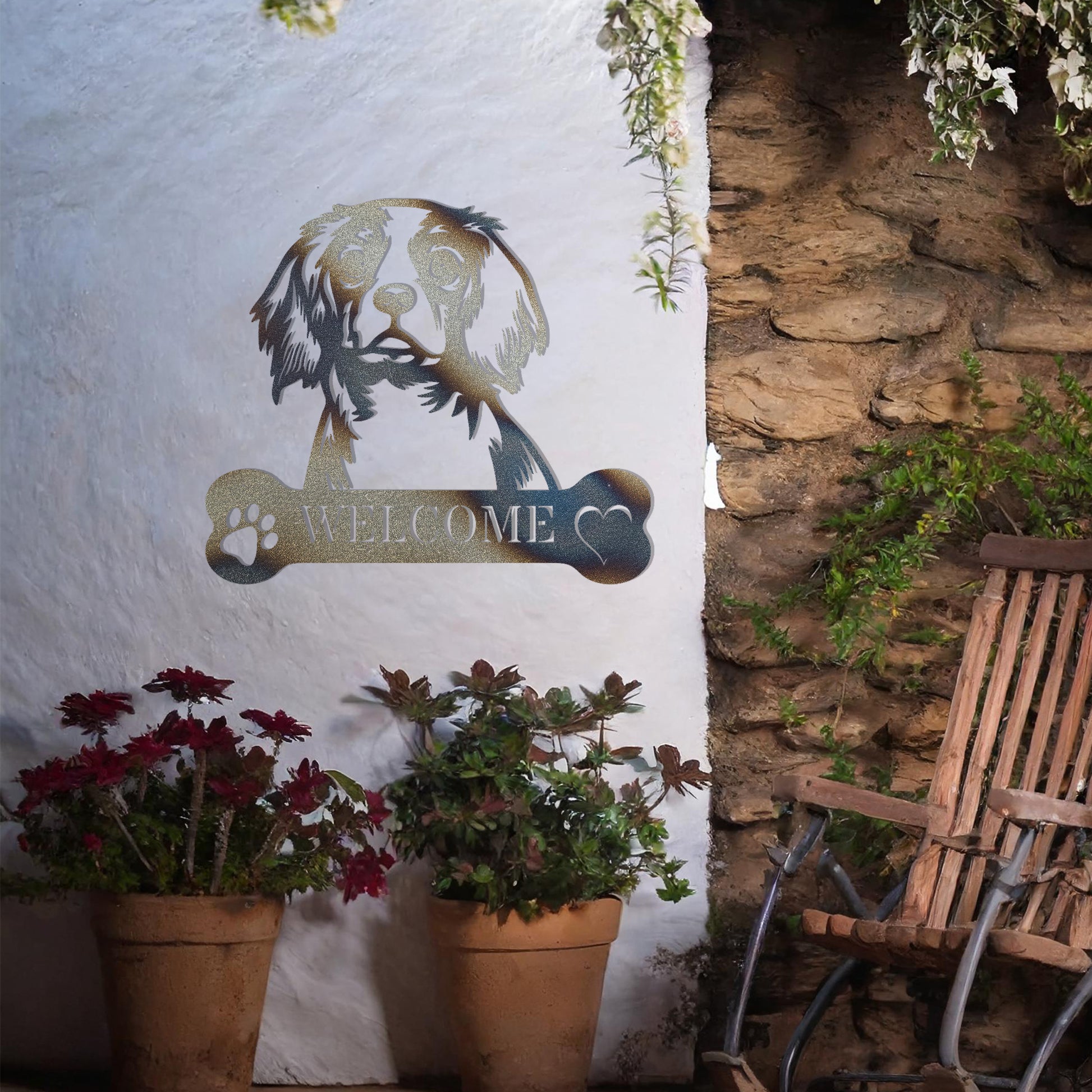 Metal Cavalier King Charles Spaniel dog design with a bone-shaped 'WELCOME' text and paw prints, perfect for adding a charming and welcoming touch to entryways or outdoor spaces.