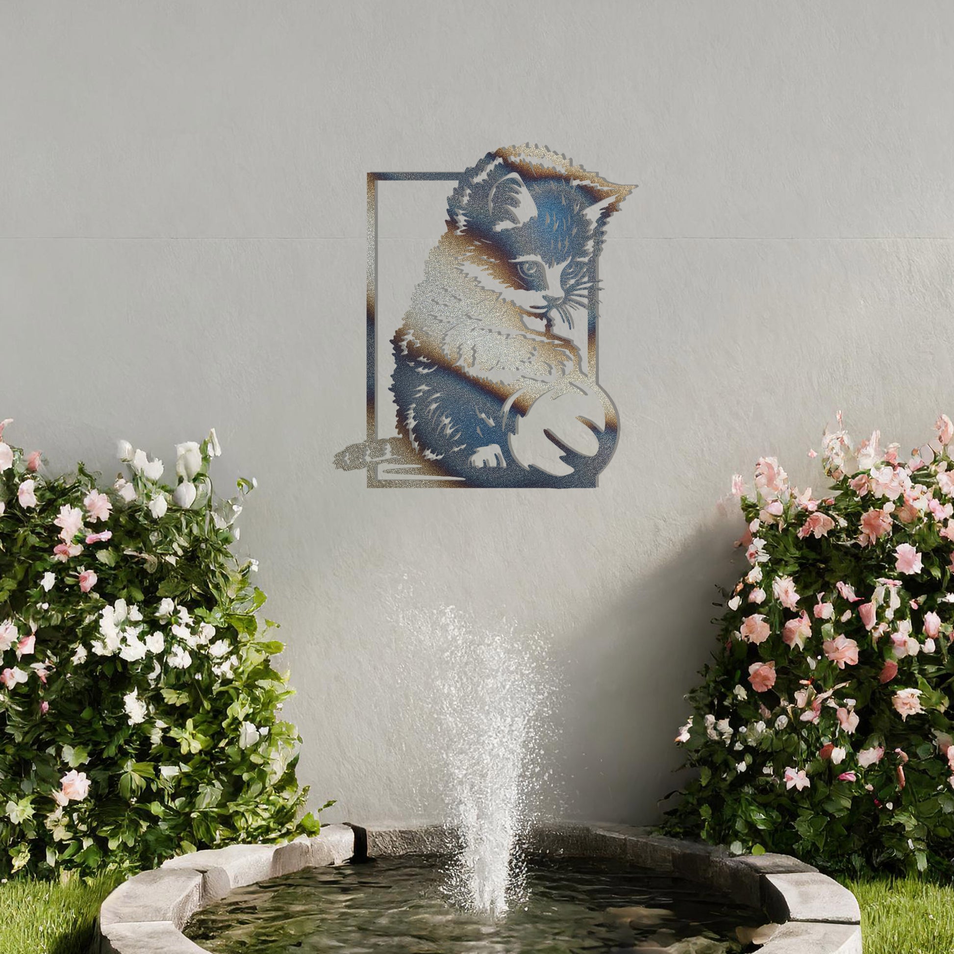 This is a cute metal wall art design featuring a playful kitten sitting and playing with a ball. The design captures the cat's natural curiosity and playful spirit, making it a perfect addition for cat lovers or for adding a touch of whimsy to a space