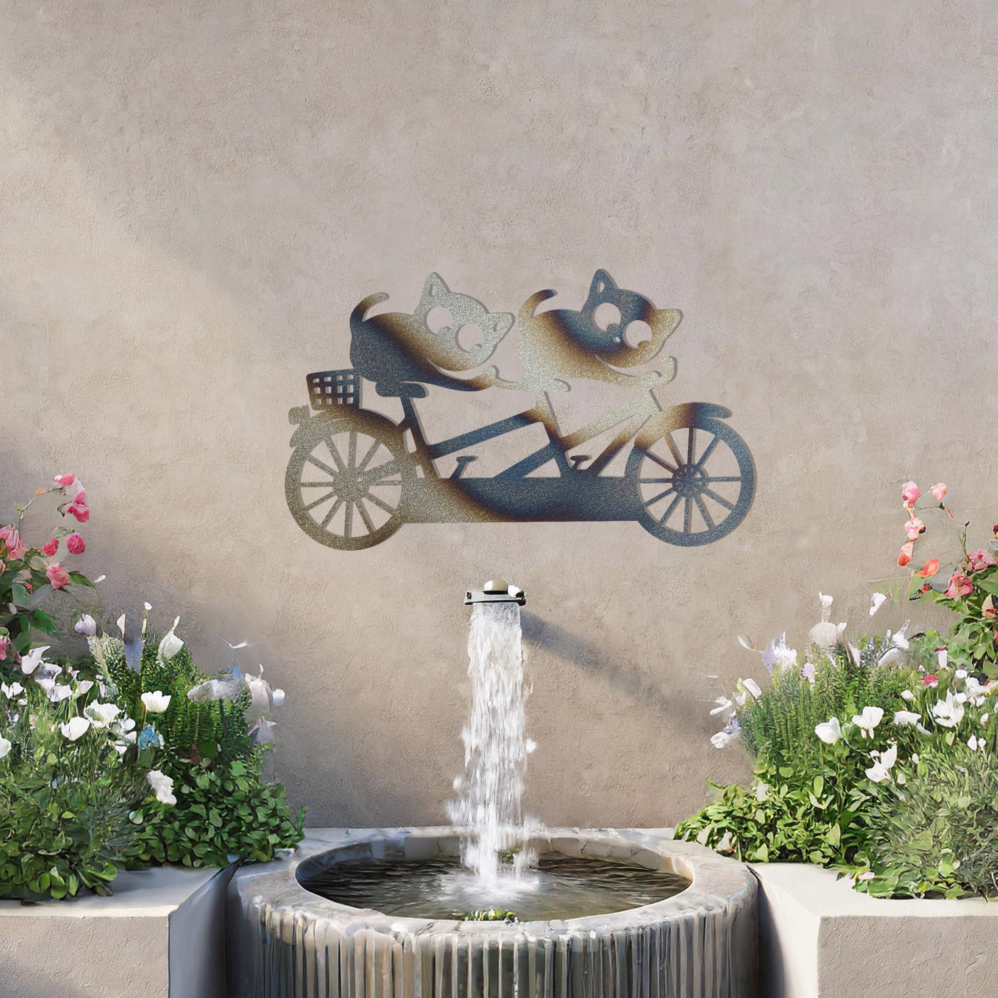A charming metal wall art design depicting two playful cats riding a tandem bicycle, capturing a whimsical and fun moment with intricate details of the bike and expressive cat figures.