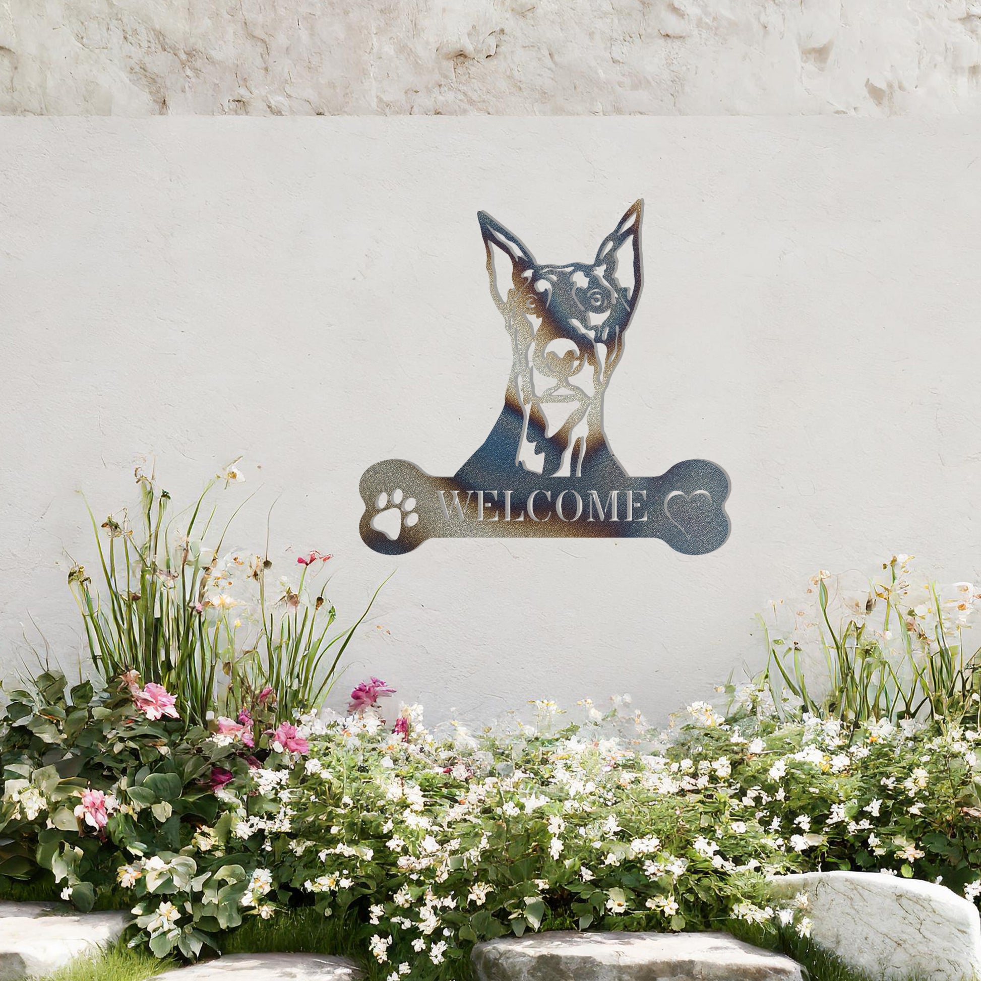 Metal Doberman dog design with a bone-shaped 'WELCOME' text and paw prints, perfect for adding a strong and welcoming touch to entryways or outdoor spaces.