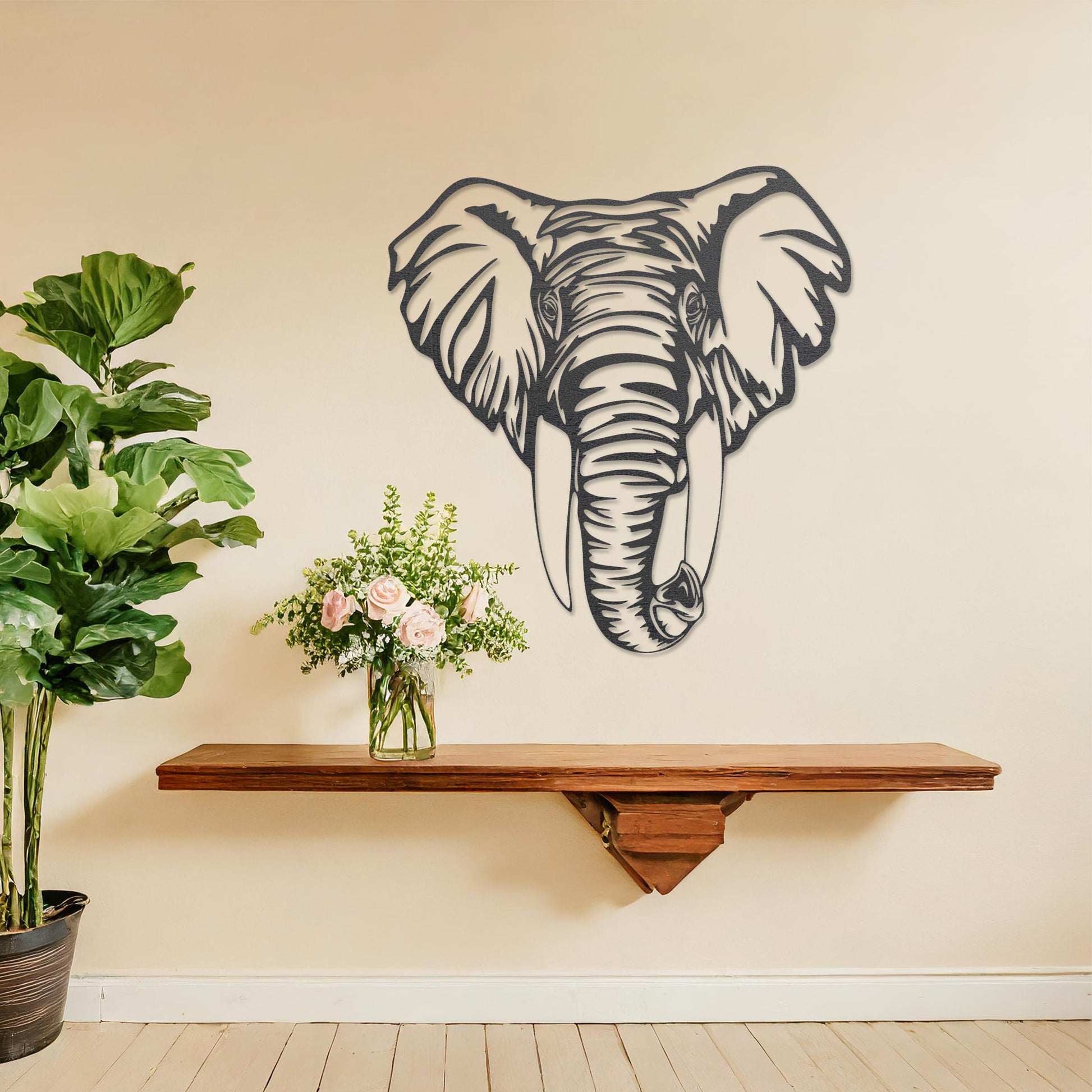 Wooden wall art featuring an intricately detailed elephant head design, displayed on a neutral wall within modern room decor, highlighting its bold and artistic craftsmanship.