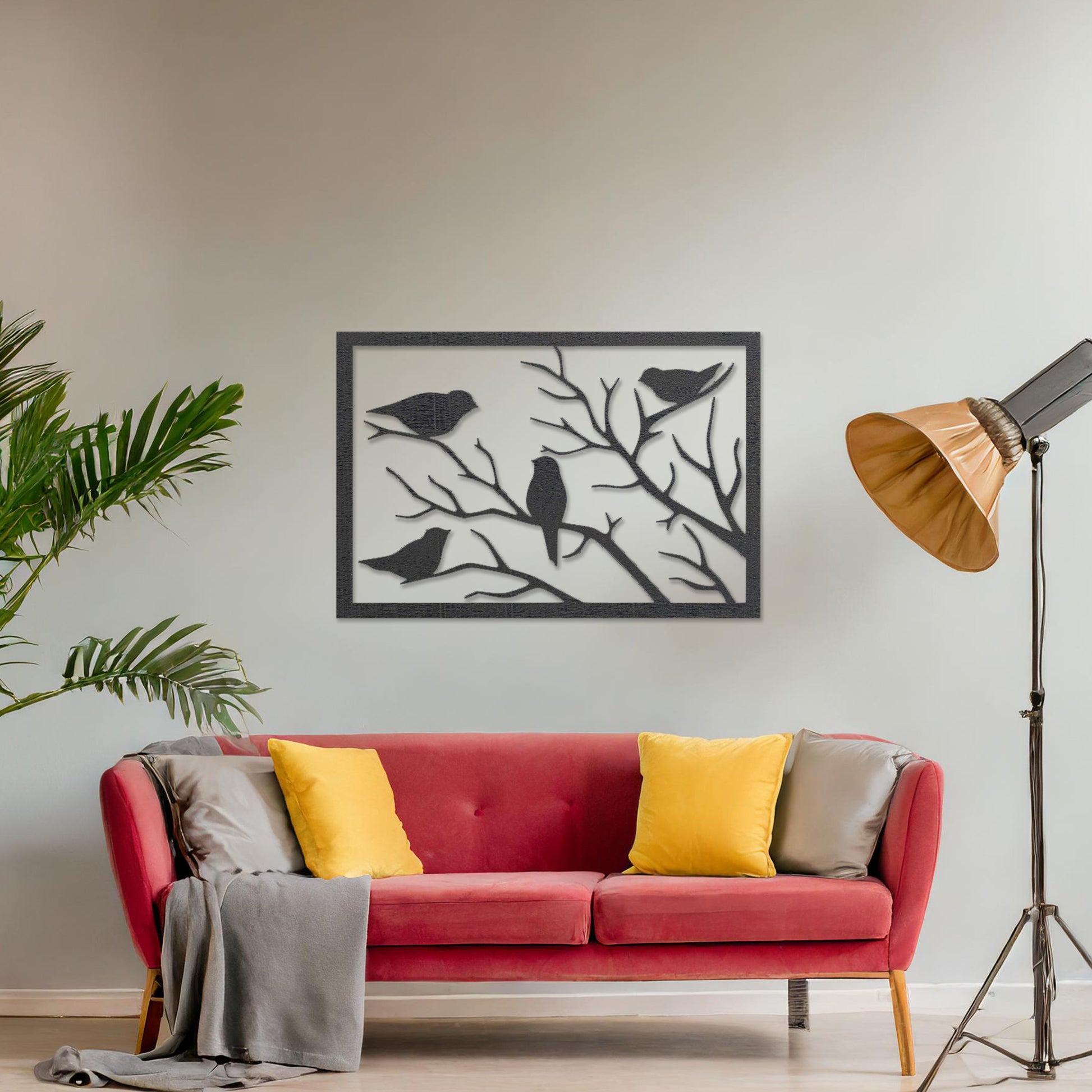 Wooden wall art featuring a rectangular design with birds perched on tree branches, displayed on a neutral wall within modern room decor, highlighting its elegant and nature-inspired craftsmanship.