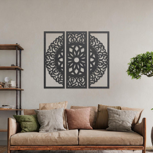 Wall art featuring a triptych design with an intricate mandala pattern framed across three panels. The artwork is displayed on a neutral wall within modern decor, adding a harmonious and decorative element to the space.