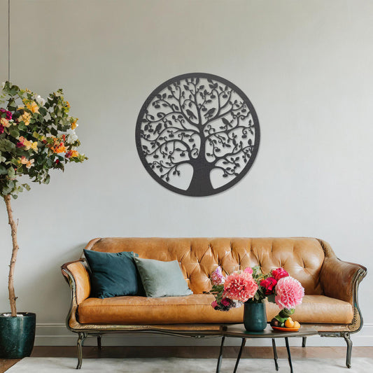 Wooden wall art featuring a circular tree design with intricate branches, leaves, and birds, displayed on a neutral wall within modern room decor, highlighting its detailed and nature-inspired craftsmanship.