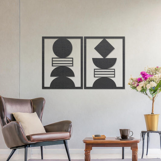 Wall art featuring a set of two geometric abstract designs, each framed with symmetrical shapes and minimalist patterns. The pieces are displayed on a neutral wall within modern room decor, enhancing the contemporary aesthetic.