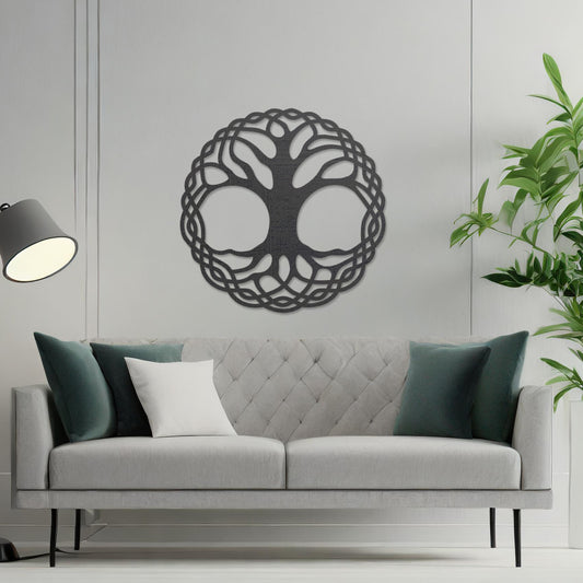 Wooden wall art depicting a circular tree of life design with intertwined roots and branches, placed on a neutral wall within a modern room decor, highlighting its intricate craftsmanship and symbolic aesthetic.