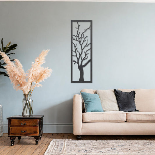 Wooden wall art design featuring a stylized tree with intricate branches, placed on a neutral wall within modern room decor. The design highlights the natural, delicate form of the tree for a minimalist aesthetic.