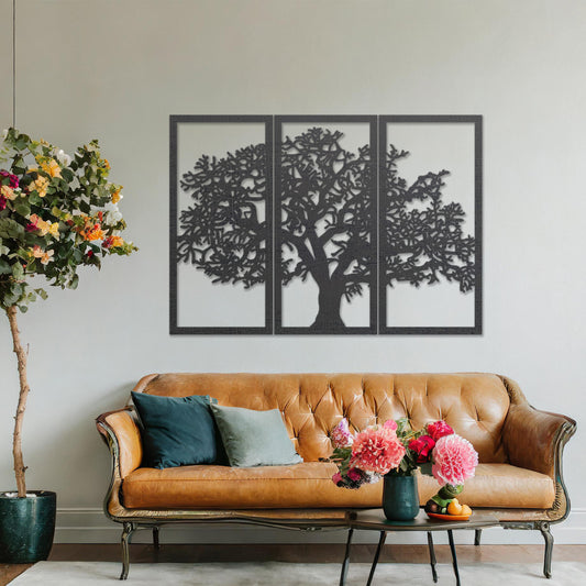 Wooden wall art in three panels depicting a detailed tree design with intricate branches, set on a neutral wall within modern room decor, highlighting its natural and artistic aesthetic.