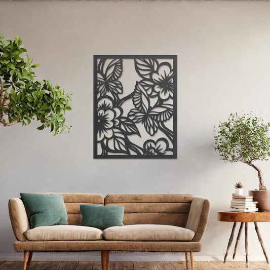 Wooden wall art featuring a square design with intricate floral and leaf patterns, showcasing a vibrant natural theme. The artwork is displayed on a neutral wall within modern room decor, highlighting its artistic and elegant appeal.