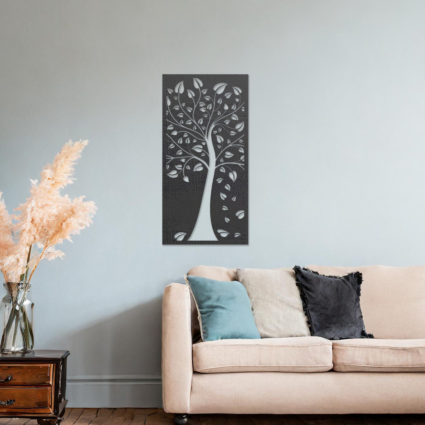This design showcases a stylized tree with intricate branches and falling leaves, all within a vertical frame. The delicate detailing evokes natural beauty, adding an elegant touch to any modern room.