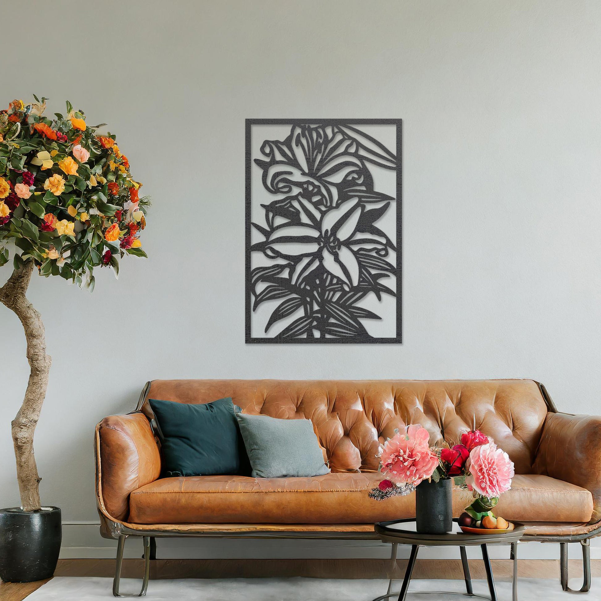Wall art featuring a botanical design of blooming lilies with intricate details of petals and leaves. The artwork is displayed on a neutral wall within modern room decor, enhancing the space with a natural and elegant touch.
