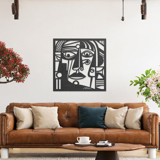 Wall art featuring an abstract face design with bold geometric shapes and intricate linework. The piece is displayed on a neutral wall within modern decor, adding an artistic and expressive focal point to the space.