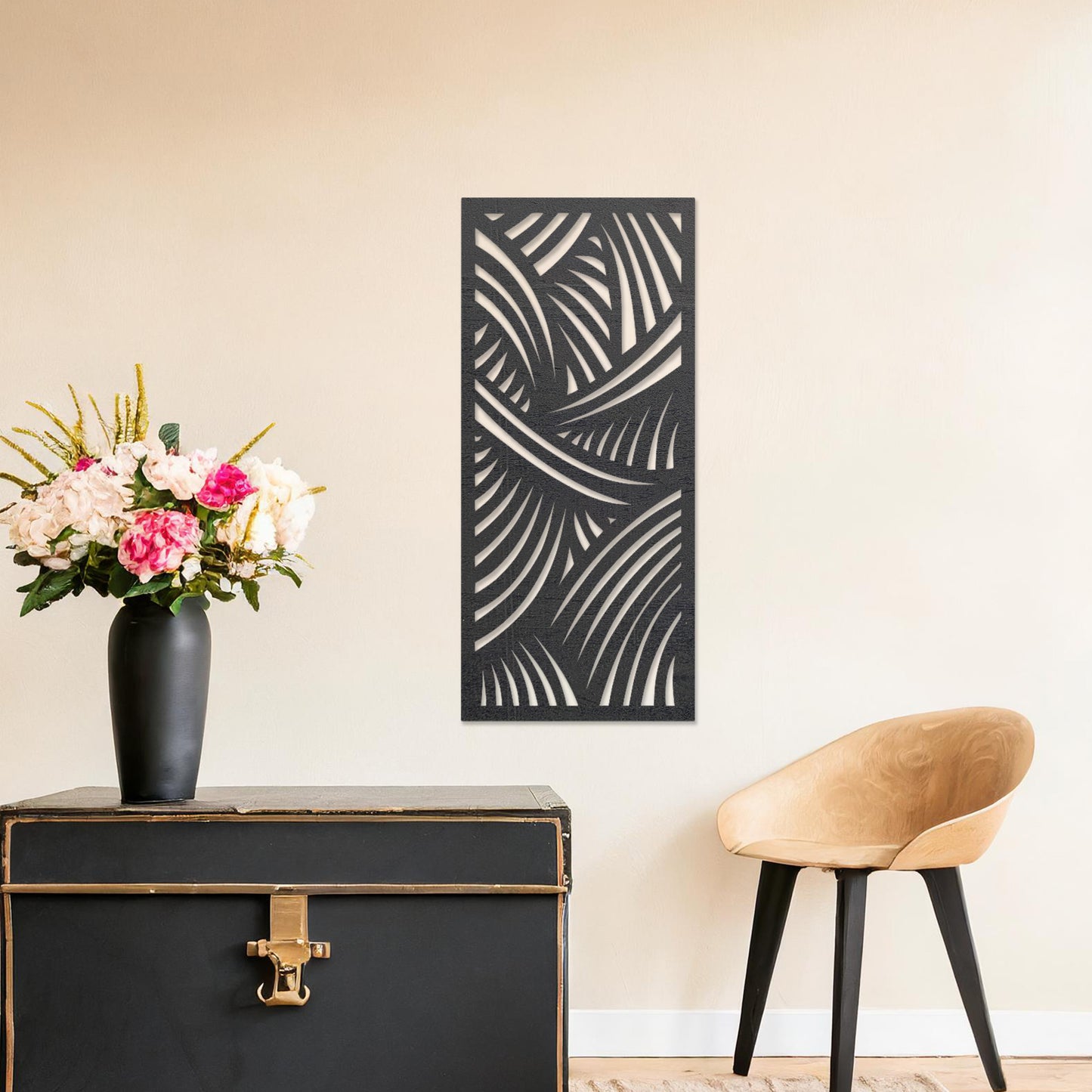 Wall art featuring an abstract design with intersecting curved lines creating a dynamic pattern. The piece is displayed on a neutral wall within modern decor, adding a bold and artistic statement to the space.
