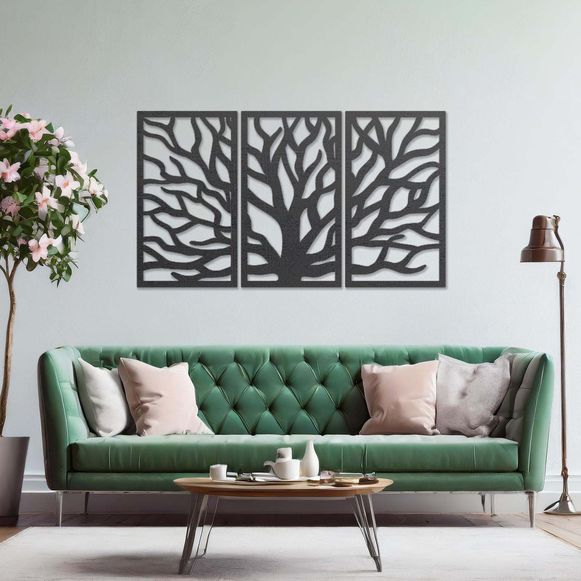 Wooden wall art consisting of three panels featuring an abstract tree branch design, displayed on a neutral wall within modern room decor, emphasising its artistic and contemporary appeal.