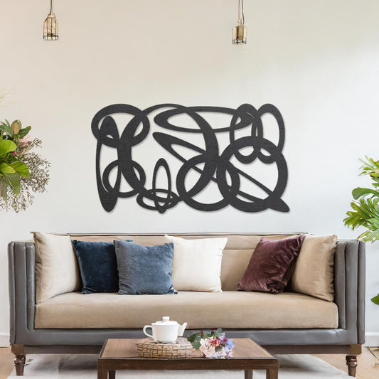 Wooden wall art design featuring an abstract composition of interwoven loops and shapes, placed on a neutral wall within modern room decor. The design combines flowing lines and organic forms for a contemporary, artistic feel.